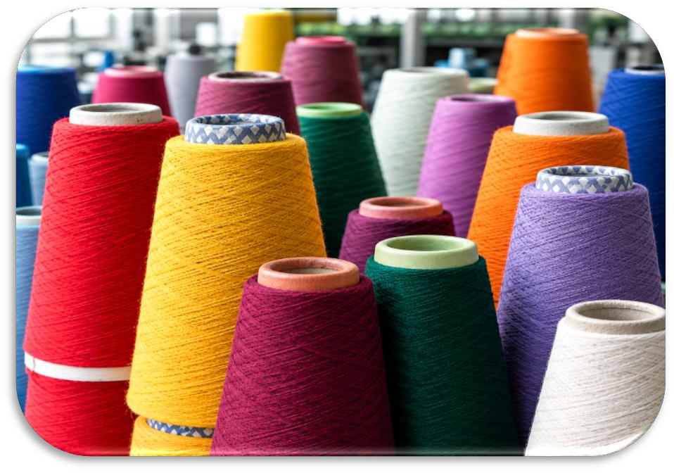 Coloured yarn cones for yarn-dyed fabrics